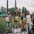 .I miejsce Jarosław Blumel bieg 1000 m obok podium Jacek Wszoła